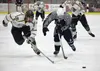 Colony senior Jake Branch (left) and Soldotna junior Jace Urban race after the puck in the second period of Saturday's North Star Conference championship game at the Soldotna Regional Sports 