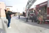 Wendy See takes a photo of her son Tanner, 12, with Mat-Su
Central firemen Chris Olivera and Anthony Linfors as they were at
Wal Mart for the 'Fill the Boot' fundraiser.