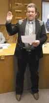 Wasilla City Councilman Steve Lovell, pictured here at his swearing in ceremony in October 2012, was killed Sunday when a piece of heavy equipment he was using to set up a jump for a dirt bik
