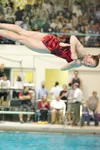 ROBERT DeBERRY/Frontiersman Wasilla Warrior Rachel Kennedy tucks
her arms in tight to her chest during one of her three dives at the
ASAA/First National Bank Alaska State Swimming and Diving
