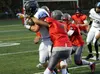 Wasilla linebacker Nate Sturgeon tries to bring down Chugiak senior Derryk Snell during a 42-6 loss to the Mustangs Saturday, Sept. 23, 2017. Snell scored four times in the Chugiak win. Court