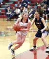 Houston's Abbie Baird drives to the basket during a win over Homer. Bruce Eggleston/matsusports.net