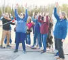 Teachers past and present took to the stage to sing the Larson Elementary School song. Katie Stavick/Frontiersman