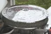 GREG JOHNSON/Frontiersman Rainwater beads on the chrome air
filter cover of an open-hood 1929 Ford.