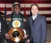 Courtesy photo Lt. Gov. Sean Parnell, right, poses with Maurice
Bailey, the 2007 recipient of the Governor’s Veterans Advocacy
Award. Parnell presented the award on behalf of the governor for