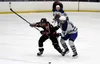 Houston forward Isaiah Squires tries to get past Palmer's Luke Thiesen during a 5-1 win over the Moose Monday, Jan. 22, 2018, at the MTA Events Center in Palmer. Courtesy of Bruce Eggleston/m