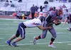 Wasilla receiver Zach Shogren breaks a tackle after a catch during a 50-34 loss to North Pole Friday at Wasilla High School. Tim Rockey/For the Frontiersman