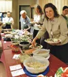Courtesy photos Visitors at the 2008 Alaskan Vegetarian
Society'€™s Thanksgiving potluck, as seen in these photos, enjoy a
wide variety of vegan dishes.
