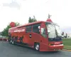 Above, the wellsfargo.com bus was outside the Cottonwood Creek
Mall in Wasilla last week. The 45-foot-long bus is on tour in
Alaska. Jonathan Davis, below, is a Wells Fargo employee who has
b