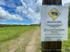A sign has been posted with the alert of a bear sighting around the Matanuska Experiment Farm and Extension Center.
