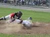 Former Mat-Su Miners outfielder Cameron Frost slides into home plate before the tag to score the game-winning run in a 1-0 win over the Alaska Goldpanners July 22, 2015. The Miners clinched t