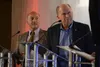 Independent Alaska governor candidate Bill Walker (right) and Democratic candidate Les Gara (left) listen to a question from the debate moderator Wednesday, Sept. 21, 2022 at the Alaska Chamb