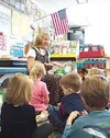 Wendy Bowen leads her class of kindergartners and first-graders
in reciting a poem in Spanish. During the first part of each day
Bowen teaches all her lessons in Spanish as part of a language