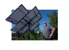 Sen. Kevin McCabe stands with one of his many solar arrays at his home in Big Lake. Photo illustration by J. David McChesney/Frontiersman