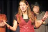 ROBERT DeBERRY/Frontiersman Palmer High School senior Kailyn
Beetch runs through a song during practice Monday for the school’s
musical performance, ‘Blame it on the movies,’ which opens
Thur