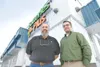 ROBERT DeBERRY/Frontiersman Bob Dixon, left, and manager Ben
Bannock run the new Wasilla location for Batteries Plus. The store
opened last week.