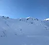 Cracks in the snow can be seen in the El Dorado Bowl in Hatcher Pass in February of 2018. Tim Rockey/Frontiersman