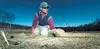 Amos Stephens lays some sod at Settlers Bay Golf Course last
week. Golfers are enjoying warmer temperatures by hitting the links
at several area golf courses, which are all open.WILLIAM
WOODY