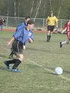 Palmer's Luke Burton moves to make a swipe at the ball during
the second half of Palmer's 8-0 loss to Juneau Douglas at Palmer
High School on Thursday. JEREMIAH BARTZ/ Frontiersman