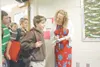 ROBERT DeBERRY/Frontiersman Palmer Junior Middle School
sixth-grade teacher Tuesday Twohy talks with incoming sixth-grader
Gabriel Lorusso, 11, Monday morning as other students line up to
get