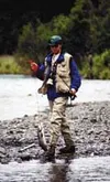 CASEY RESSLER/Frontiersman file photo Brad Thompson of East
Lansing, Mich., shows off a red salmon he caught on the Russian
River.