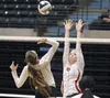 Wasilla junior Olivia Vincent reaches for a block during a 3-2 win over the West Valley Wolfpack during the first round of the ASAA/First National Bank 4A State Volleyball Championships Nov. 