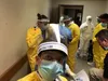 Capt. Holly Beard, an Army entomologist, prepares to conduct an inspection while deployed to Newark, New Jersey. Beard joined an Army Urban Augmentation Medical Task force that helped support