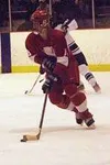 Derke Banbury moves the puck up the ice for the Warriors during
Wasilla's 8-4 loss to rival Colony in prep hockey action at the
Brett Memorial Ice Arena Wednesday. Photo by JEREMIAH BARTZ/
Fr