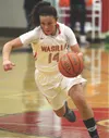 Wasilla senior Kaylyn Kelly moves the ball up the floor for the Warriors. Wasilla has faced some midseason adversity, which has included illness, injury and its first loss of the season to an