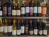 Bottles of wine line shelves at a Fred Meyer grocery store in Anchorage on June 29. Per-capita alcohol consumption fell in Alaska in the early months of the COVID-19 pandemic. Drops were in a