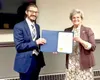 Wasilla Mayor Glenda Ledford presenting the proclamation to Rabbi Mendy Greenberg for education and sharing day 2025.