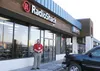 Radio Shack manager Carl Pierce poses in front of the Wasilla store in the Creekside Plaza along the Parks Highway. While Radio Shack has announced plans to close up to 1,100 stores, Alaska r