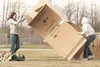 Participants in the Family Promise Mat-Su Cardboard City event set up their cardboard house together in this 2008 Frontiersman file photo. This year’s event begins Friday at 5:30 p.m. at the 