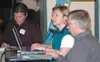 Alaska Division of Oil and Gas employee Nancy Welsh, center,
records recommendations given by seven group representatives at the
Feb. 18 coal-bed methane workshop discussing surface impacts.
