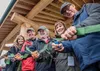 Alaska State Fair board members snip the ribbon to mark the grand opening of a new covered pavilion at the fairgrounds. The state fair’s annual meeting is Feb. 13 at Raven Hall. Fair members 