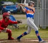 Palmer's Brayden Methven makes contact during a win over the Wasilla Road Warriors. Courtesy of Bryan Boyett