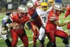 Wasilla senior Devin Otto breaks a tackle during a 31-29 loss to Bartlett in the large schools quarterfinals Oct. 10 at Wasilla High School. For more photos from the game, see matsusports.net