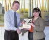 Mat-Su College Director Dr. Talis Colberg presenting Aurora
Rogers with her Constitution Day Contest award. Along with the
certificate, Aurora won a three-credit tuition waiver for spring
sem
