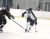 JEREMIAH BARTZ/Frontiersman Colony junior Morgan McJimsey moves
the puck forward during a loss to West on Saturday. McJimsey scored
shorthanded during a win over Wasilla Friday.