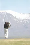 MATT TUNSETH/Frontiersman Golfer James Contreras of Chandler,
Ariz., hits his tee shot on the par-5, 600-yard first hole at
Palmer Golf Course Sunday during the state’s only local qualifying
