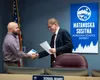 Anthony Pitcher, the new school board member, gets congratulations from Dr. Randy Trani before swearing in on Wednesday, Dec. 6, 2023. J. David McChesney/Frontiersman