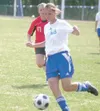 JEREMIAH BARTZ/Frontiersman Palmer senior Krysta Theisen
prepares to kick the ball to the center of the field during a match
against Kenai last week. Theisen will play college soccer at
Easte