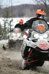 (ROBERT DeBERRY/Frontiersman) The all female team of Tammy
barber, front and Jana Pevan race down the rough trail of Big Lake
at the start of the 2000 mile Iron Dog Snowmachine Race Sunday.