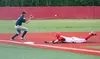 Kenai infielder Davey Belger catches a throw from right field as Wasilla’s Kyle Graham slides into third during a doubleheader at Wasilla High School Saturday, June 15, 2019. Jeremiah Bartz/F