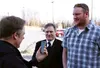 Country Legends disc jockey Mike Ford interviews cartoonist Chad Carpenter and Wasilla resident Roy Eason at the premier of 'Moose: The Movie' at The Valley Cinema Thursday evening. Carpenter