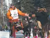Big Lake musher Jake Berkowitz high-fives fans as he heads out on the Iditarod Trail Sled Dog Race in March of 2013. Berkowitz is in a fight to save one of his dogs, Wizard, from being destro