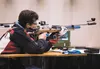 U.S. Air Force Maj. Teresa Sellers, a nurse anesthetist from Albion, Iowa, fires an air rifle during the sitting air rifle shooting competition at the 2017 Warrior Games at the McCormick Plac