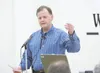 RUSSELL STIGALL/Frontiersman Tuckerman Babcock, Matanuska
Electric Association’s director of human resources and corporate
affairs, answers a question at a recent public hearing about MEA’s
p