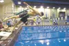 Colony’s Alex Kessler launches off the starting block during the boys 200-yard freestyle event at the Region III Swimming and Diving Championships last year. Kessler returns as one of the top