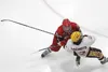 Wasilla defenseman Andrew Cooley forces Dimond's Brandon Sakumoto to the ice during a 4-3 win over the Lynx in the first round of the 2014 ASAA First National Cup. Cooley, a 2014 graduate of 